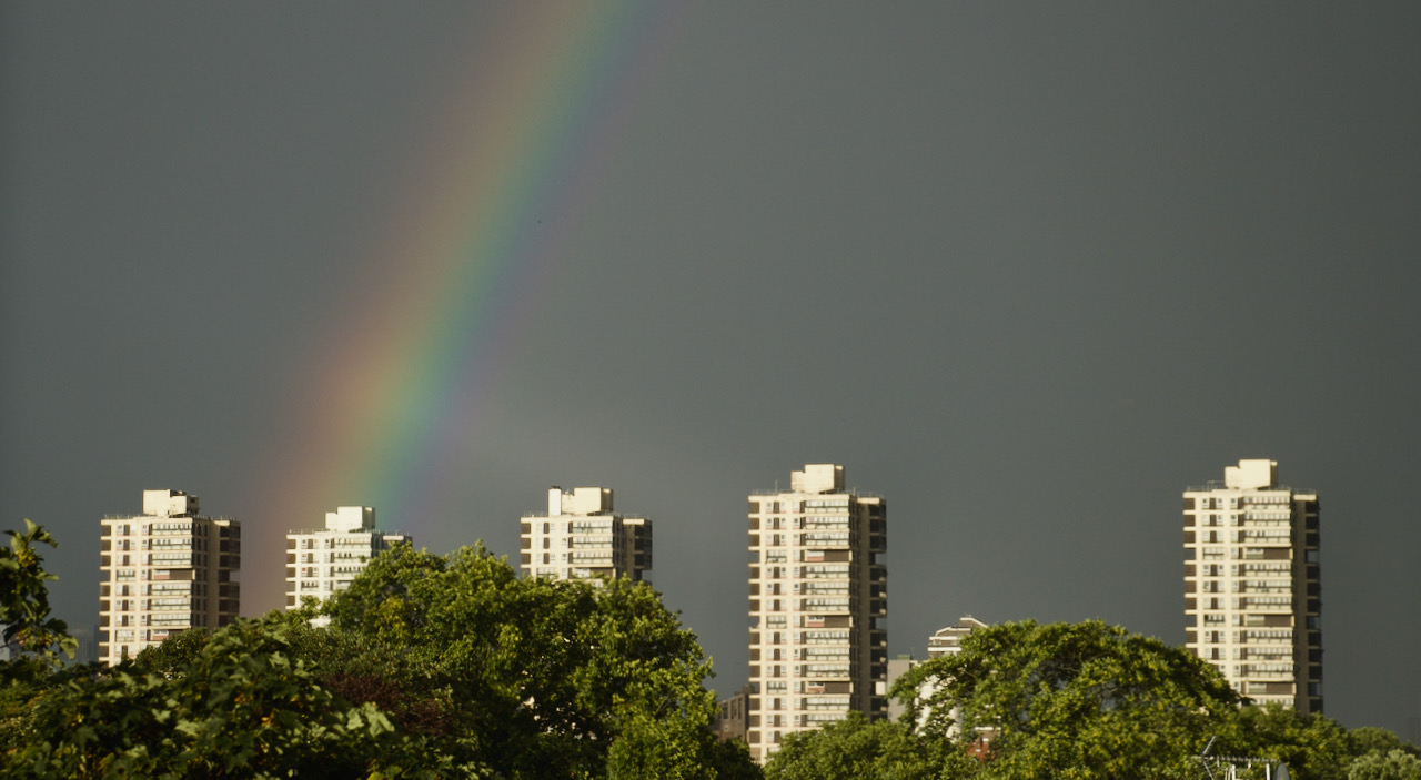 Rainbow over South London tower blocks